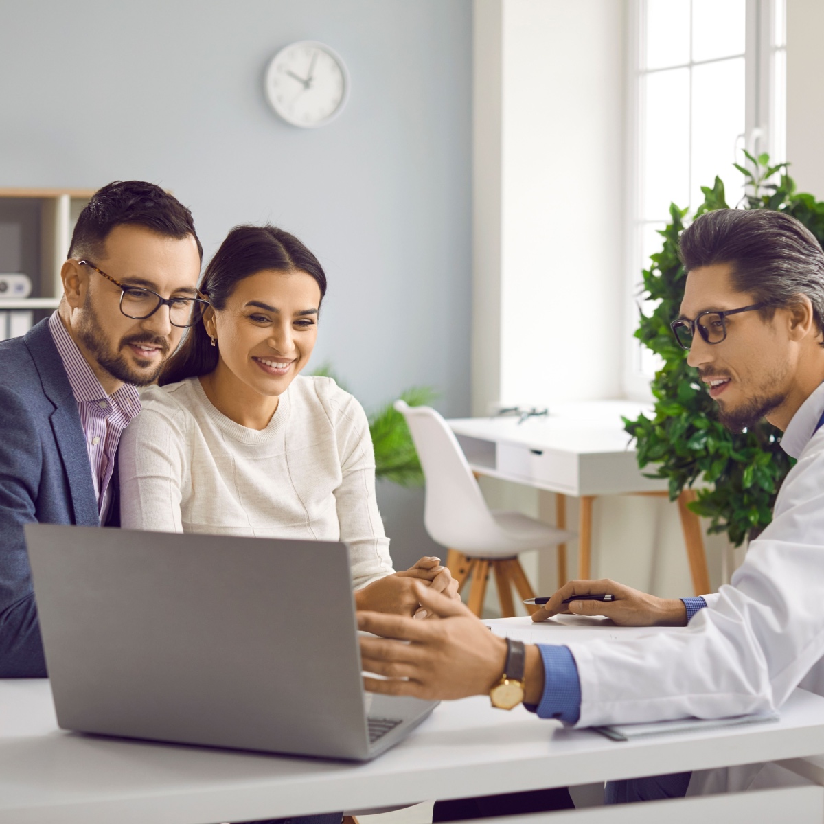 A couple talking to a the Woodlands IVF specialist